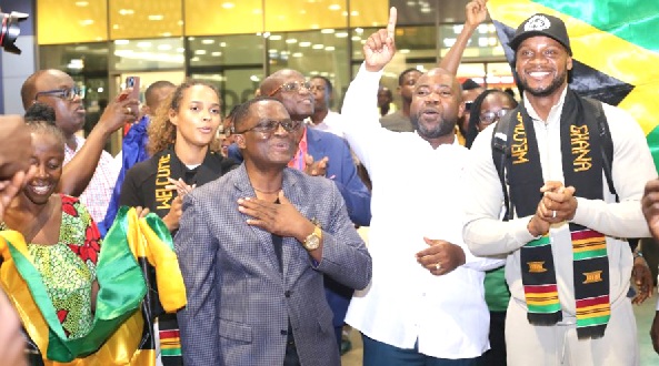 •Asafa Powell (right) was welcomed at the airport by Samson Deen (2nd from right) GPC president; Ben Nunoo Mensah (middle), GOC president, and other officials