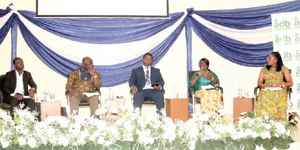 • Prof. Adobea Yaa Owusu (2nd from right), Social Division, Institute of Statistical, Social and Economic Research, making a remark during the panel discussion while the other panellists wait to take their turn. Picture: MAXWELL OCLOO