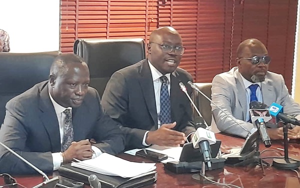  Dr Cassiel Ato Forson (right), Minority Leader, adressing the press conference in Accra. With him is Emmanuel Armah-Kofi Buah, MP for Ellembele