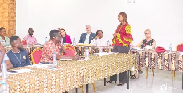 • Constance Elizabeth Swaniker (standing) speaking at the launch of the advisory committees