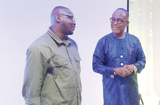 • Most Rev. Samuel N. Mensah (right) interacting with Sulley Amin Abubakar, CEO of Zaacoal Ltd, at the event 