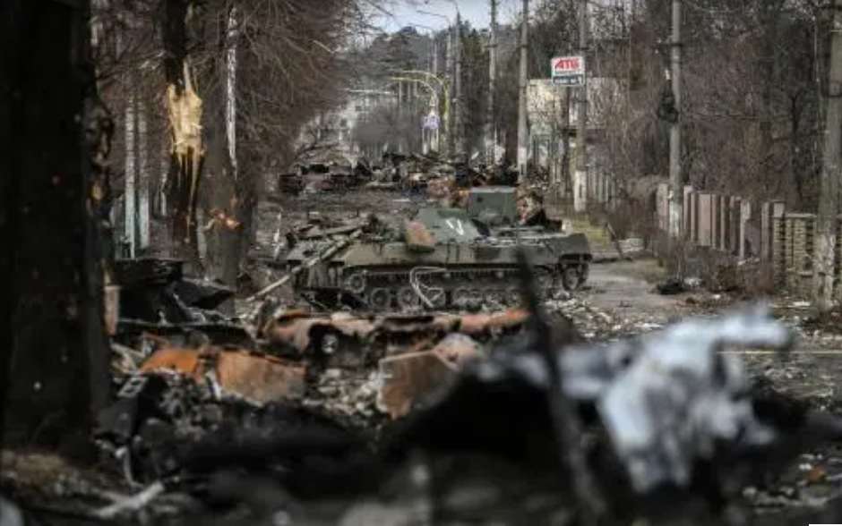 Destroyed Russian armored vehicles in the city of Bucha, northwest of Kyiv, Ukraine, on March 4, 2022. © 2022 ARIS MESSINIS/AFP via Getty Images