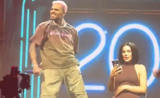 Chris Brown throws fan’s phone into the crowd for filming while on stage
