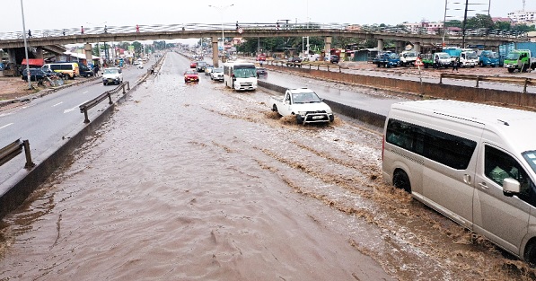 • A portion of the Achimota-Ofankor Highway flooded after yesterday’s rain. Picture: DOUGLAS ANANE-FRIMPONG
