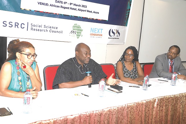 Prof. Gordon Awandare (2nd from  left), Pro Vice-Chancellor, UG, speaking at the workshop in Accra. Those with him are Prof. Akosua Adomako Ampofo (left), a Lecturer at the Institute of African Studies, UG, Dr Nana Aku Anyidoho (2nd from right), Associate Professor and Director of the Centre for Social Policy Studies, UG, and Dr Cyril Obi (right), Programme Director of the African Peace Building Network and Next Generation of Social Science in Africa. Picture: GABRIEL AHIABOR