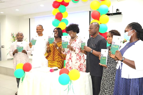 Tina Mensah (middle) with Dr Patrick Kuma-Aboagye (3rd from right), Director-General, Ghana Health Service, and some health sector workers launching the Strategic Plan 
