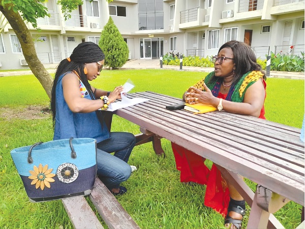 • Augustina Tawiah, a Daily Graphic reporter, interviewing Olivia Serwaa Opare on International Women's Day