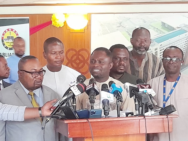 Kwabena Minta Akandoh (arrowed), Minority spokesperson on Health, addressing the press conference 