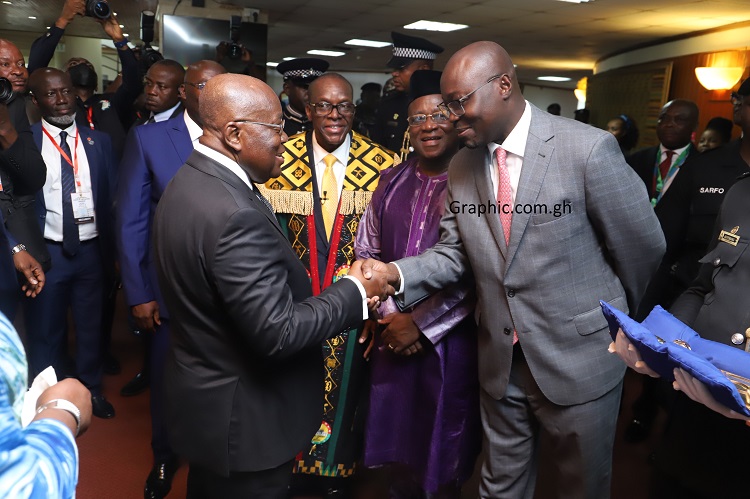 President Akufo-Addo in a handshake with Dr Ato Forson (right), Minority Leader, while Alban Sumana Bagbin (2nd from left), Speaker of Parliament and Osei Kyei-Mensah-Bonsu (2nd from right), Majority Leader, look on. Picture: SAMUEL TEI ADANO