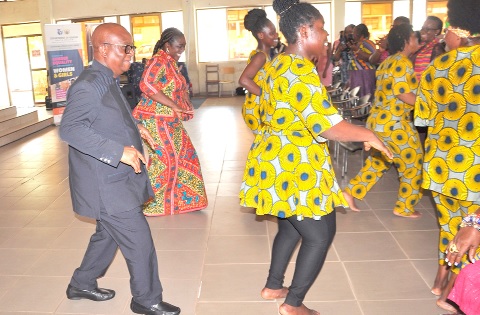 • Dr Archibald Yao Letsa (left), Volta Regional Minister, and  Thywill Eyra Kpe, Volta Regional Director of Gender, joined the UHAS Cultural Troupe to display their ''tsiagbekor'' skills