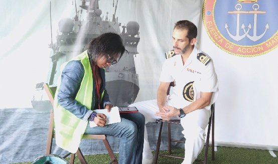 • Lt Commander Marcos de Sousa Fuchs (right), Captain, the AUDAZ P45 Warship, speaking with Augustina Tawiah, a Daily Graphic Staff Writer. Picture: ELVIS NII NOI DOWUONA