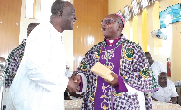 • Rt Rev. Felix Annancy (right), the Bishop of  Koforidua Diocese of the Anglican Church, receiving a cash donation from Alan John Kwadwo Kyerematen, a presidential aspirant of the New Patriotic Party, to support the hospital project