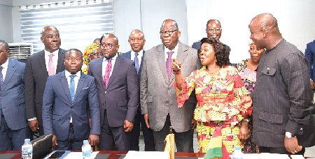 Cecilia Abena Dapaah (2nd from right), Minister of Sanitation and Water Resources, interacting with Laurent Tchagba (3rd from right), Ivorian Minister for Water and Forestry, and some members of his delegation during the meeting. Among them is Samuel Abu Jinapor (right), Minster of Lands and Natural Resources. Picture: EBOW HANSON