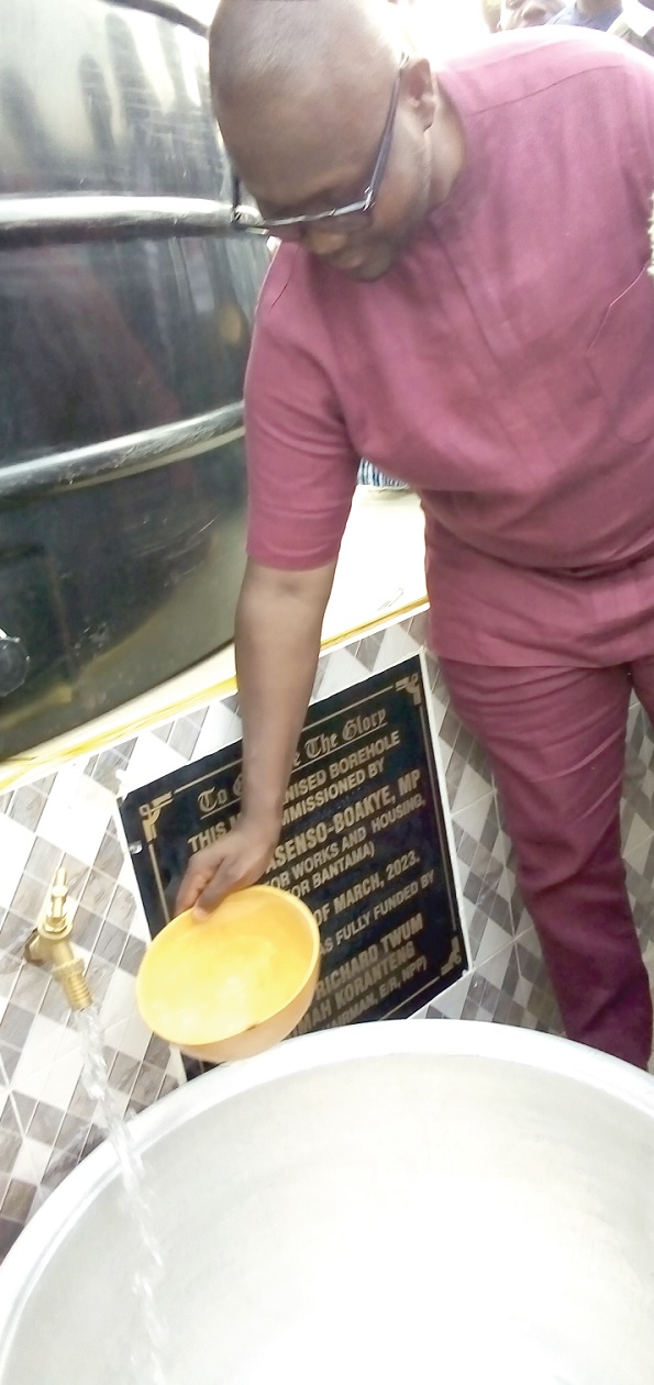 • Francis Asenso-Boakye, Minister of Works and Housing, fetching water from one of the boreholes