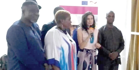• Marta Brignone (2nd from right), Programme Officer, Macro-economic and Trade Section at the EU, being assisted by Nii Doodo Dodoo (right), Country Director of the British Council, and Mawusi Awity (2nd from left), D-G of TVET, to launch the project
