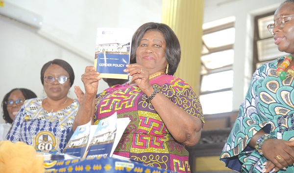 Mary Chinery-Hesse (right), Chancellor, University of Ghana (UG), launching the Gender Policy book. With her is Emilia Agyei-Mensah, Registrar, UG