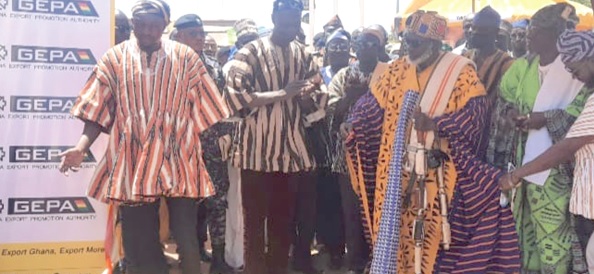•Shani Alhassan Shaibu (2nd from left), Northern Regional Minister, being assisted by Naa Mahamadu Bawa, Paramount Chief of Nanton, to cut the ribbon to officially open the summit