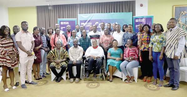 • Solomon Antumwini (seated left), Director of Programme and Partnership, British Council, and other dignitaries with a section of the alumni after the networking event in Kumasi