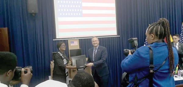 • Douglas Emhoff,  husband of the US Vice-President, presenting one of the laptop computers to Ellen Adjoa Sowa, the acting Executive Director of the Legal Aid Commission