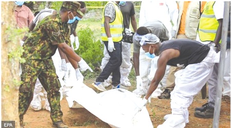 • Detectives and forensic experts at the site of the mass killing of the 15 people in Kenya