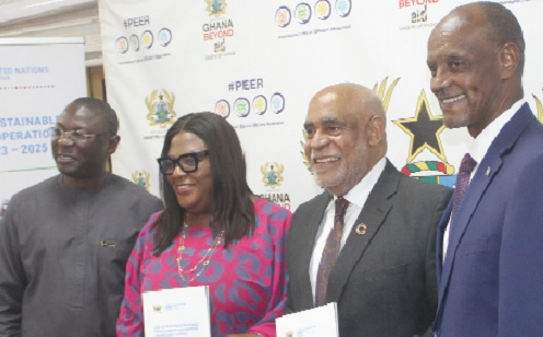 • Charles Abani (2nd from right), UN Resident Coordinator, and Eva  Mends (2nd from left), Chief Director of Ministry of Finance, displaying the documents. With them are Mohammed Amin Adam (left), Minister of State for Finance, and Salvator Niyonzima (right), United Nations Resident Coordinator in Benin. Picture: ESTHER ADJORKOR ADJEI