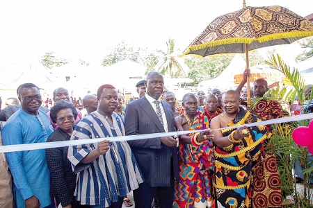 •  Chief Justice Anin Yeboah (middle), Rev. John Ntim Fordjour (3rd from left), Member of Parliament for Assin South, being assisted by some chiefs to inaugurate the circuit court (inset), in Assin South 