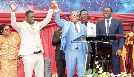   Dr Stephen Wengam (3rd from right), General Superintendent, Assemblies of God, officially inducting Michael Offei Ayesu (2nd from left), Regional Superintendent, Greater Accra West Assemblies of God, into office. Picture: ERNEST KODZI