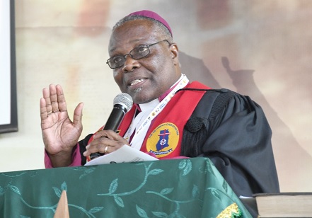 • Rt Rev. Emmanuel Borlabi Bortey (inset) addressing the opening session of the synod of the Accra Diocese of the Methodist Church, Ghana