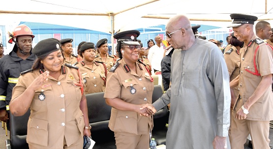 • Ambrose Dery (2nd from right), Minister for the Interior, exchanging greetings with some officers of the Ghana National Fire Service during the special service to commemorate the International Firefighters’ Day and the launch of the 60th anniversary of the service. With him is Julius A. Kuunor (right), Chief Fire Officer. Picture: EBOW HANSON