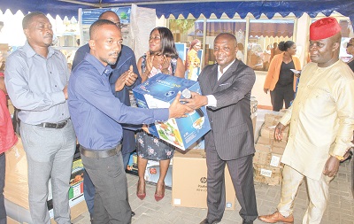 Dr Andrew Gordon (2nd from left), HOD, Hospitality Department, Accra Technical University, receiving the equipment from Dr James Antwi (2nd from right), CEO, Consciential Ltd. Picture: ERNEST KODZI