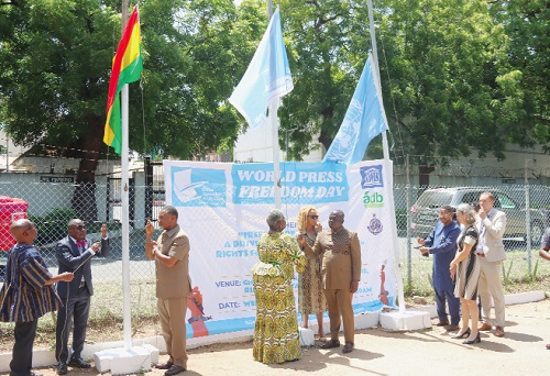 Albert Kwabena Dwumfour (5th from left), President, Ghana Journalists Association, assisted by Gifty Affenyi-Dadzie (4th from left), Former President, Ghana Journalists Association, and some dignitaries to hoist the flag of Ghana, the United Nations and the Ghana Journalists Association to mark the World Press Freedom Day in Accra. Picture: ELVIS NII NOI DOWUONA