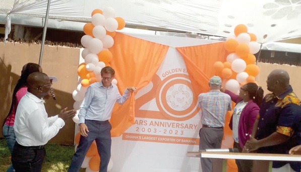 Benedict John Rich (2nd from left), Managing Director of GEL, and Olivier Chassang (3rd from right), Vice-President of Compagnie Fruitiere, Ghana, unveiling a logo for the 20th anniversary of Golden Exotic Limited
