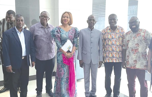 Jean Mensa (3rd from left) with some leading members of the NDC after the meeting.