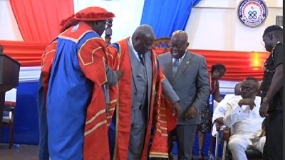 President Akufo-Addo (right) assisted Nana Ansah Chairman of the UEW Governing Council and the Vice Chancellor, Prof Avoke to robe Neenyi Ghartey as chancellor