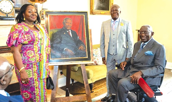 Former President John Agyekum Kufuor (right) in the company of Otumfuo Osei Tutu II, the Asantehene, and his wife, Lady Julia, standing by the portrait