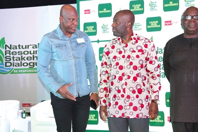 Ato Afful (left), Managing Director, Graphic Communications Group Limited, interacting with Kojo Oppong Nkrumah, Minister of Information, after the GCGL, Natural Resources Stakeholders Dialogue. Picture: ELVIS NII NOI DOWUONA