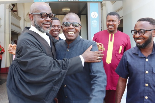 Frank Davies (left), counsel for the plaintif, congratulating his client, Michael Ankomah-Nimfah (2nd from left), after the case at the Supreme Court. Picture: ELVIS NII NOI DOWUONA