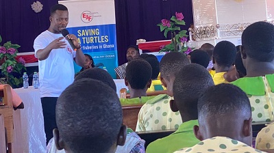 Charles Smith, Communications Officer of EJF addressing participants at the symposium on World Turtle Day at Gomoa Fetteh
