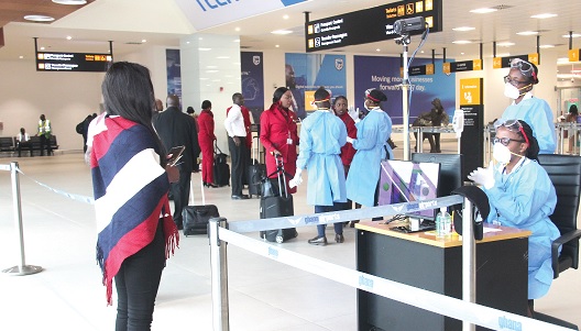 FLASKBACK:  Travellers being screened on their arrival at the Kotoka International Airport 