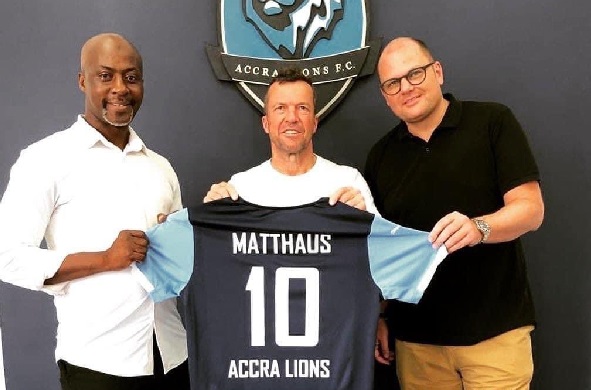 Lothar Matthaeus (middle) with an Accra Lions jersey after buying a stake in the team