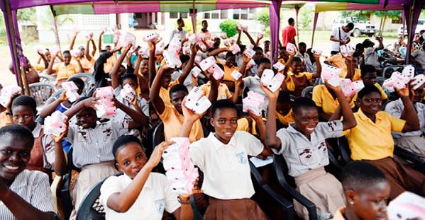 Some of the students who benefited from Plan International Ghana 4,000 sanitary pads distributed to girls in schools in the Okere District in the Eastern Region last year to mark the day