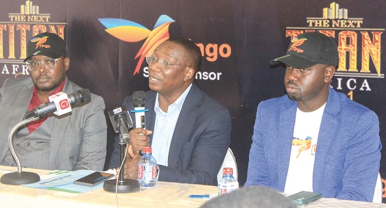 Mide Akinlaja (middle), Executive Producer, "The Next Titan Africa" business reality show, addressing the media in Accra. With him is Alao Ayoade (left), Chief Operating Officer, Tingo Mobile, and Tobi Aloba, Country Director, Tingo. Picture: ERNEST KODZI