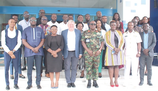 Tom Norring (4th from left) and Major-General Richard Addo Gyane (4th from right) with the participants and some of the facilitators. Picture: DELLA RUSSEL OCLOO