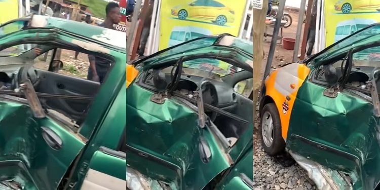 Taxi cab smashed by train at Alajo