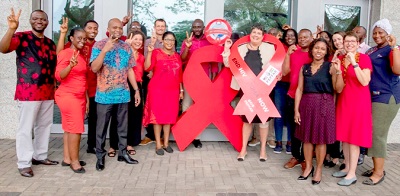 PEPFAR Team with Ambassador Virginia Palmer (with ribbon) to kick-start PEPFAR 20th Anniversary