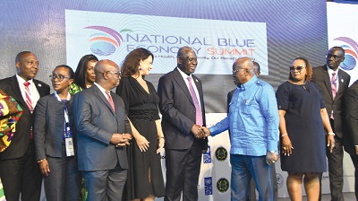 President Akufo-Addo (2nd from right) exchanging pleasantries with Dr Eugene Owusu, Special Advisor of SDG’s and Sherpa to the President on Ocean Action, during the opening session of the National Blue Economy Summit. With them are Dr Archibald Letsa (2nd from left), Volta Regional Minister and Dean of Ministers, Mrs Hawa Koomson (right), Minister of Fisheries and Aquaculture, and Ingrid Mollestard, Ambassador of Norway to Ghana. Picture: EBOW HANSON  