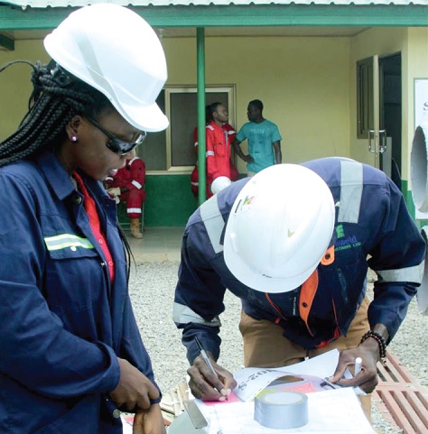 Young engineers labelling the fabrications for shipment to Singapore 