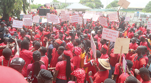 Some residents of Teshie poured onto the streets to protest against the bad roads in the community. Picture: ESTHER  ADJORKOR ADJEI