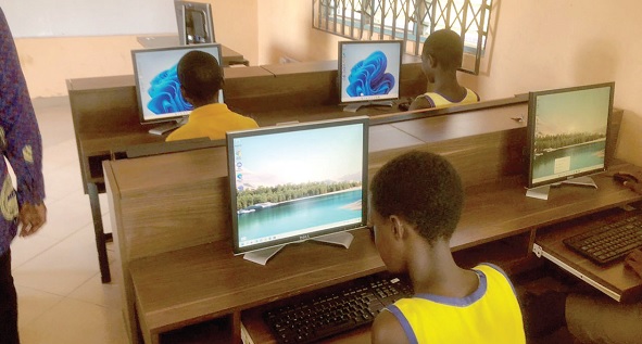Some pupils trying their hands on the computers
