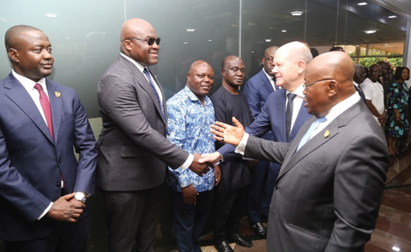 President Akufu-Addo introducing Emmanuel Adumuah Bossman (2nd from left), a Deputy Chief of Staff, to Olaf Scholz (2nd from right), German Chancellor. Picture: SAMUEL TEI ADANO
